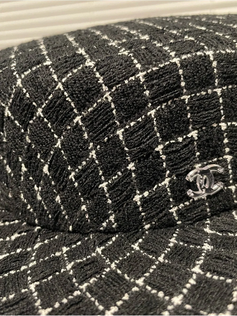 CHANEL Black Tweed Bowler with White Grid Stitching and Clear CC Pin